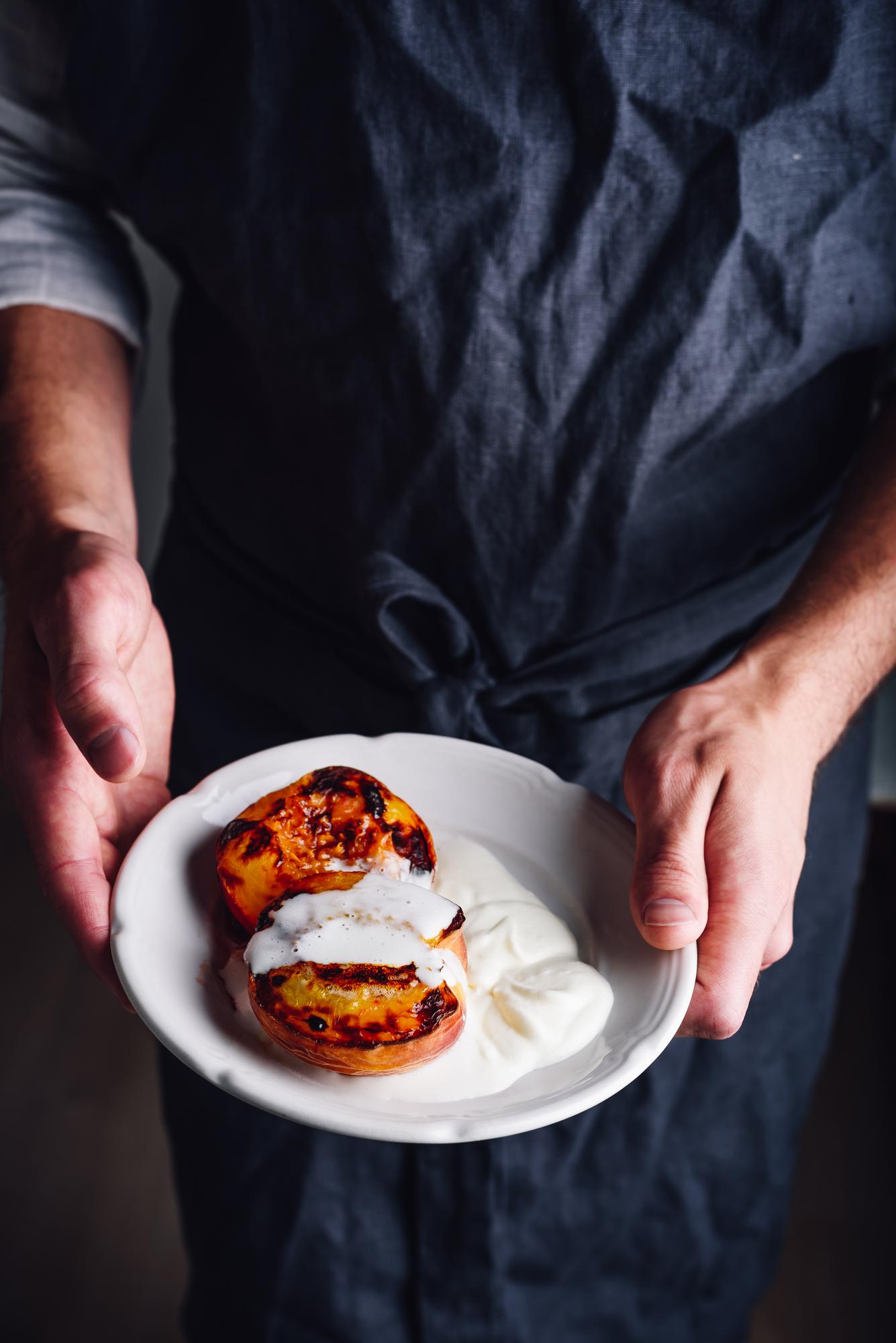 Chef demonstrating plating technique